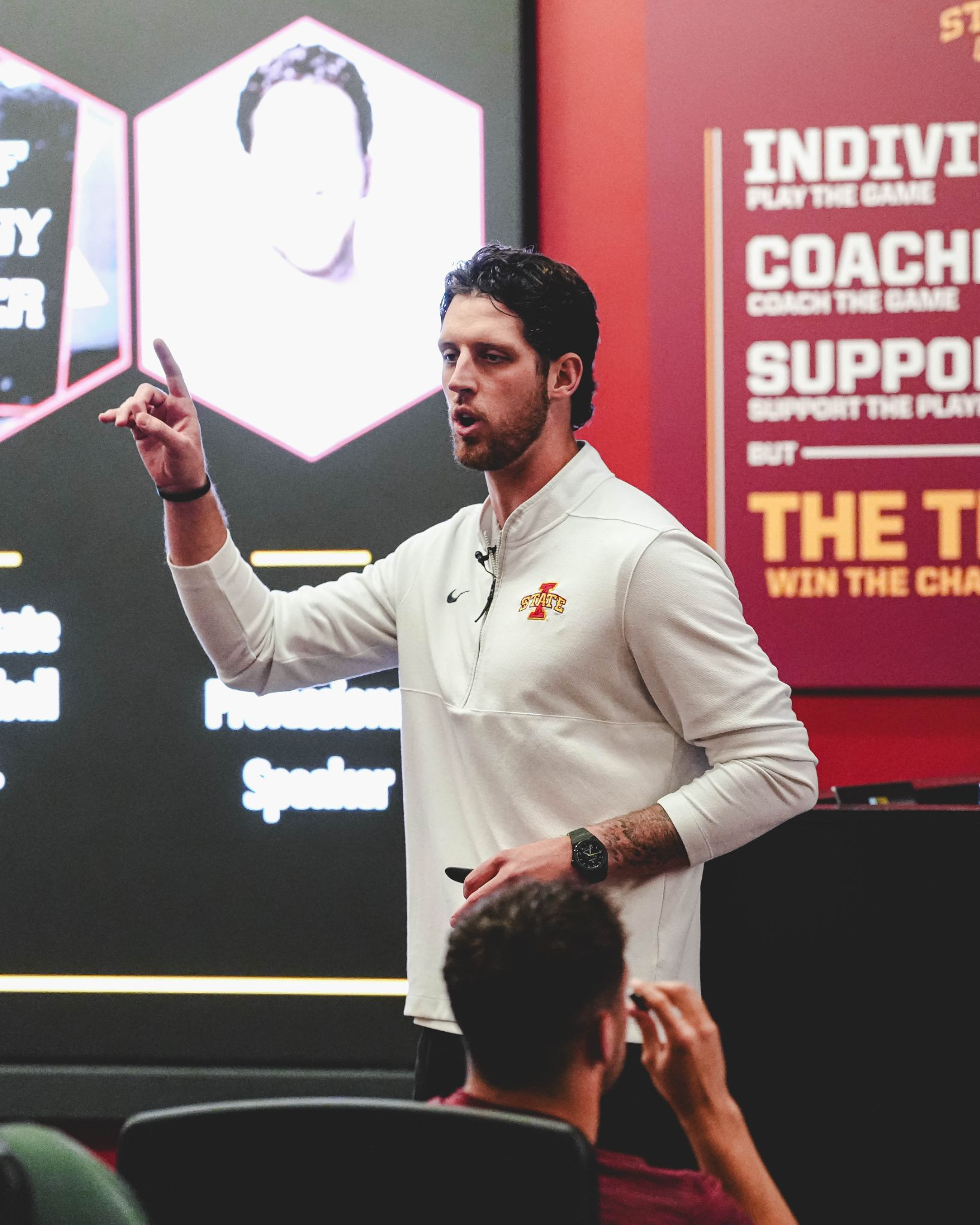 Conrad Hawley speaking on stage at Iowa State